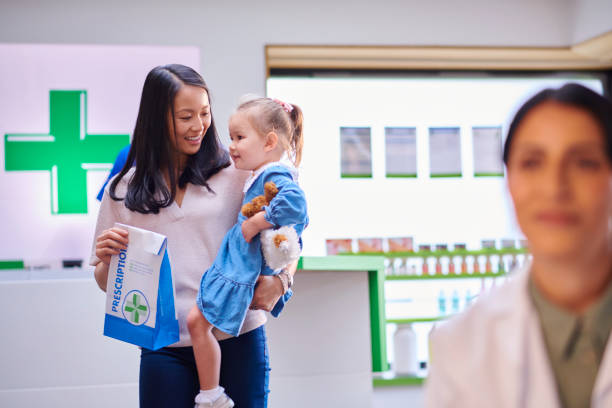 istock mother and daughter visiting the pharmacy 1678203801