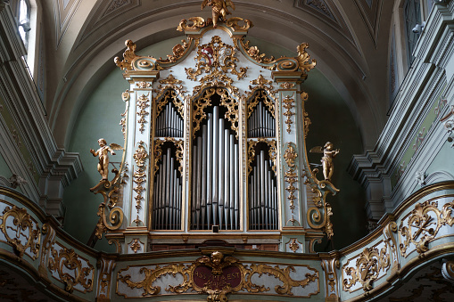 Votive ship and pipe organ in Kastelskirken - Citadel church - from the 18th century in the Citadel, Copenhagen, Denmark.
