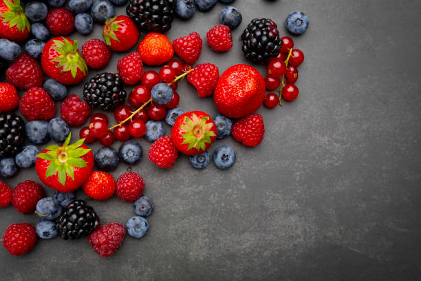 istock Berries Background. Strawberries, Blueberry, Raspberries, and Blackberry. 1678267015