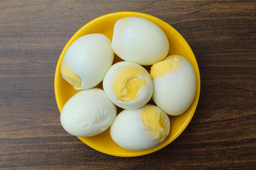 Boiled chicken eggs in a plate close-up view