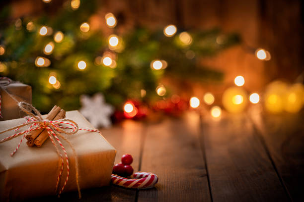 brown christmas gift box on rustic wooden table. - stick of hard candy candy stick sweet food imagens e fotografias de stock