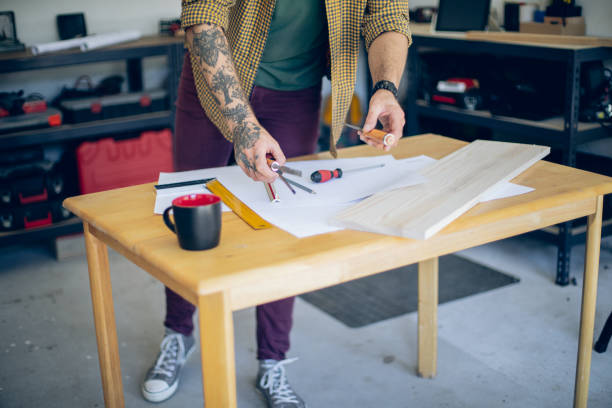 istock Craftsman picking up his equipment 1678289744