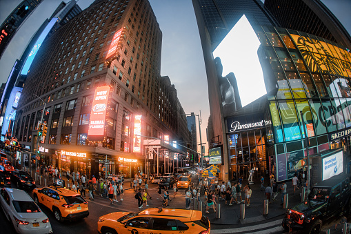 New York City, USA - Feb. 26, 2019: Intersection of Bowery and Canal street in Chinatown, with cars and pedestrians walking, and HSBC Bank