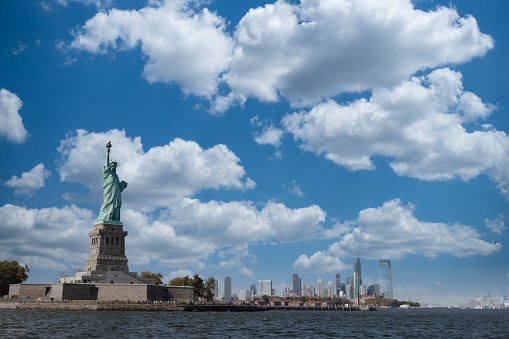 Standing on NYC Liberty Island, the Statue of Liberty is a worldwide known landmark, also called Lady Liberty. Its official name is Liberty Enlightening the World, which represents  a universal symbol of freedom and democracy.