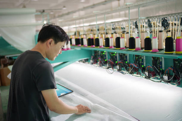 istock Male worker in textile factory 1678325950