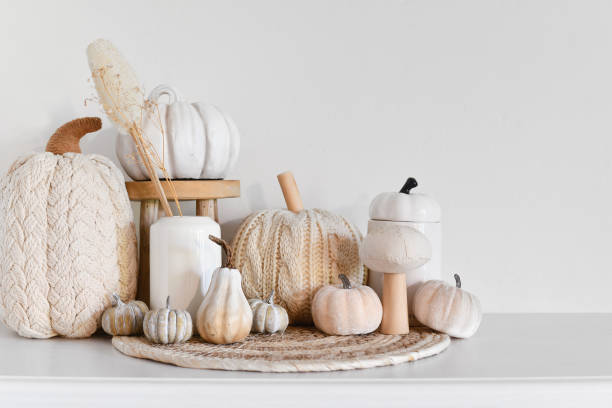 istock Boho style fall decor with pumpkins and dried flowers 1678336943