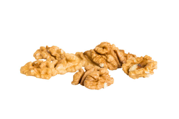 istock pile Walnut kernel isolated on white background, top view. Flat lay Healthy food concept 1678401331