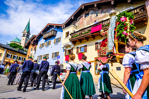 Berchtesgaden, Germany - June 8: Participants in traditional bavarian clothes at the Corpus Christi procession at June 8, 2023 in Berchtesgaden