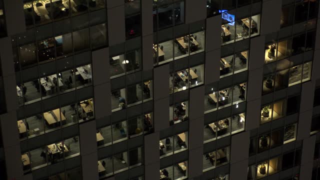 TOKYO, JAPAN : Close up shot of office building at night.