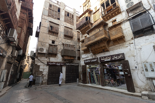 Old souk market street with traditional arabic goods in historical town of Jeddah Al Balad Saudi Arabia