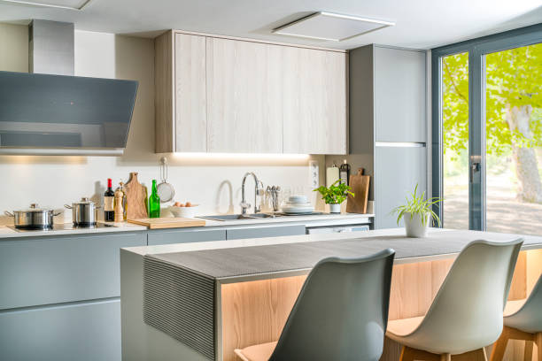 istock Modern domestic kitchen with bar counter 1678443112