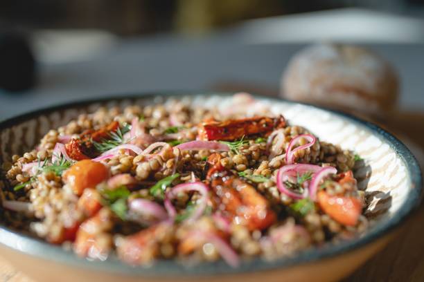 istock possesseds in a bowl on a plate with onions and carrots 1678454263