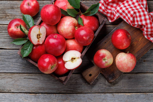 istock Wooden box with fresh red apples 1678466151