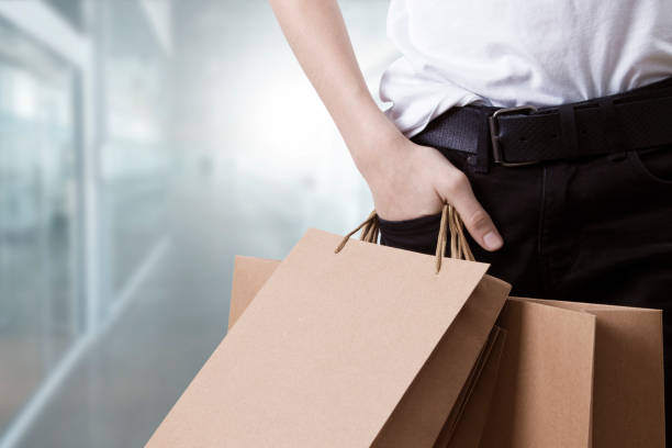 istock people with shopping bags 1678473517