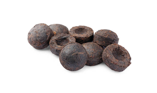 istock Cake shaped traditional Chinese pu-erh tea isolated on white 1678488368