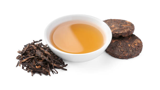 istock Traditional Chinese pu-erh tea and freshly brewed beverage isolated on white 1678488391