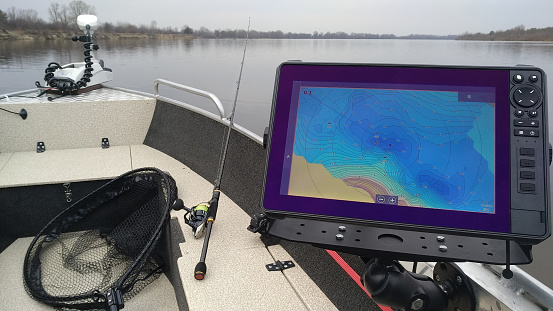 Fishing boat with echo sounder and accessories. Modern fishing.