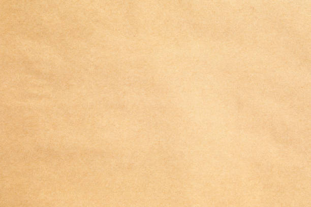 istock Kraft brown canvas paper texture with grains 1678583615
