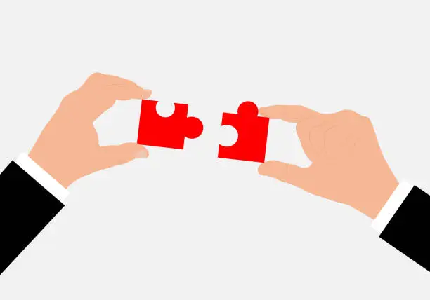 Vector illustration of working together, hands combining puzzle pieces, teamwork