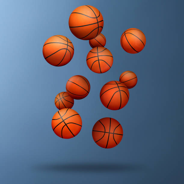 istock Many basketball balls falling on steel blue gradient background 1678637944