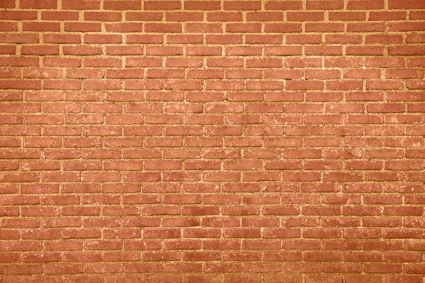 istock Texture of bright orange brick wall as background 1678654721