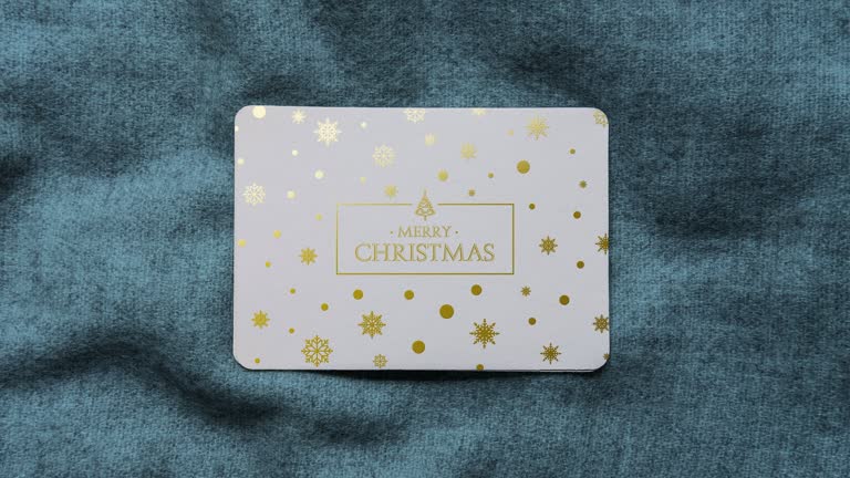 Animated gilded Christmas card with snowflakes and Merry Christmas text