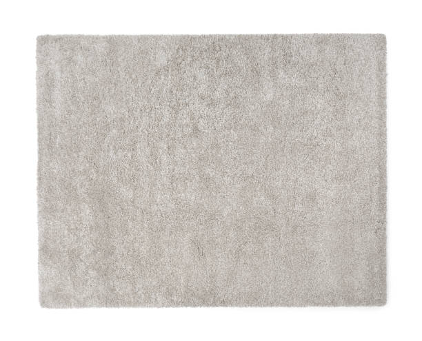 istock Stylish soft beige carpet isolated on white, above view 1678673909