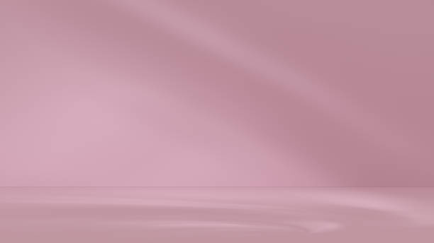 istock Empty pink color room with light beams 1678679171