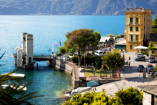 Holidays in Italy - A ferry stop along the shores of Lake Como at the colorful  village of Varenna