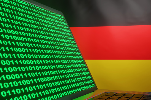 Binary Using German Code Silver Laptop Showing Computer Binary Code With National Flag Of ...