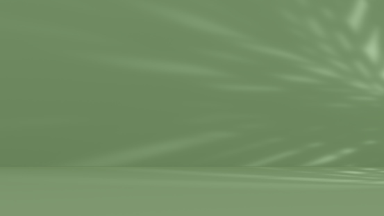 Empty green color room with light beams. Digitally generated image.
