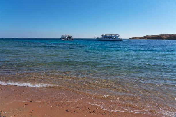White pleasure boat on the background of the nature reserve of the Ras Muhammad.