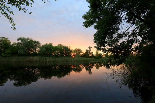 sunset landscape over small river. Take it in Ukraine