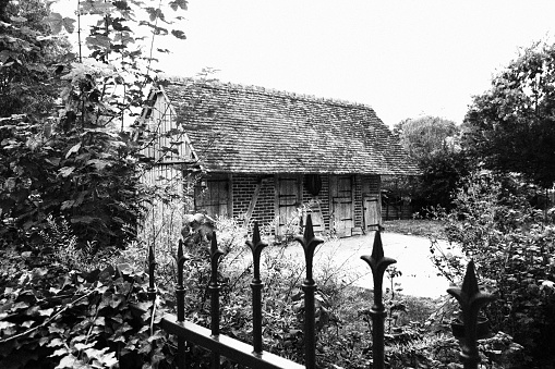old stable in black and white