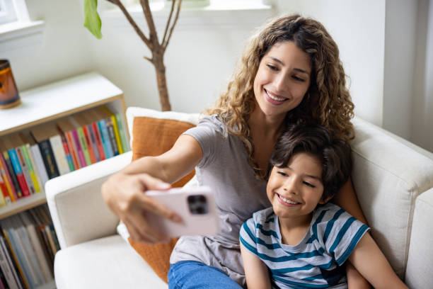 istock Loving mother taking a selfie with her son 1678743588