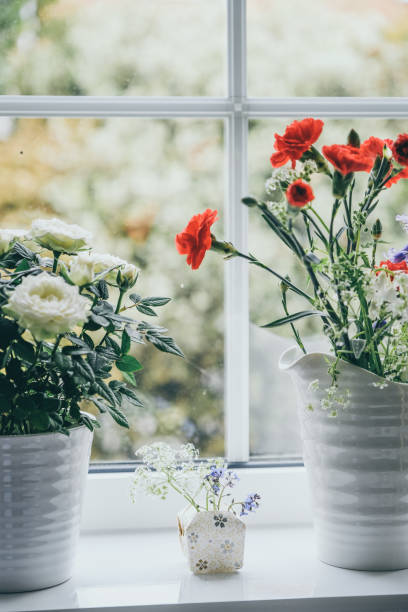 Wildflowers in small paper vase