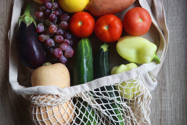 istock Mesh Bag with Seasonal Fruit and Vegetable 1678753856