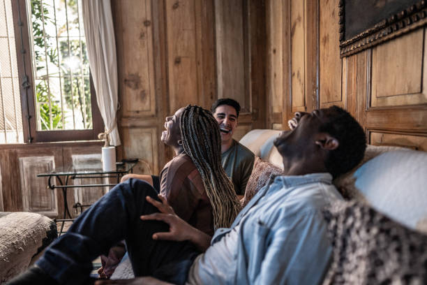 istock Friends watching TV at home 1678779074