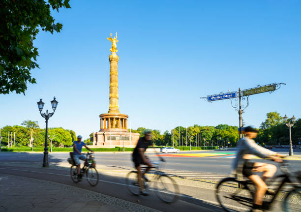 istock Bike commuters during sunset with Tiergarten park Berlin, Germany 1678791881