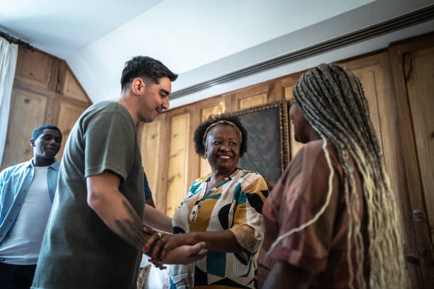 istock Mother greeting her daughter and son-in-law at home 1678810708