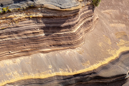 Different colored layers of volcanic tuff at the Teide volcano, Tenerife, Spain