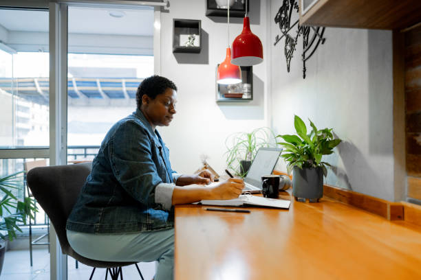 istock Mature woman working at home 1678864689