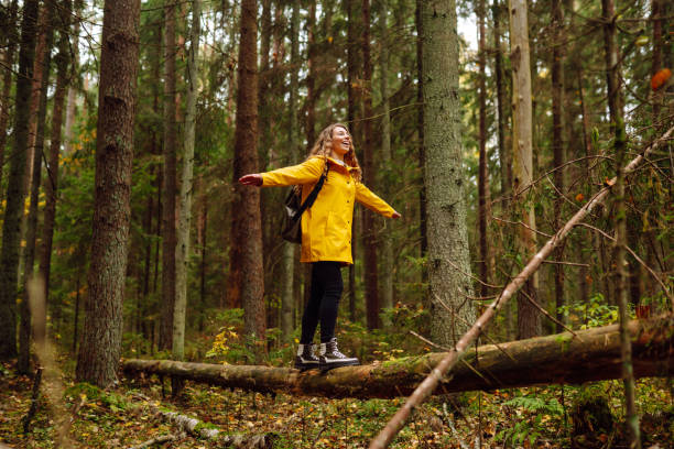 istock Traveler female with a backpack walks. 1678876481