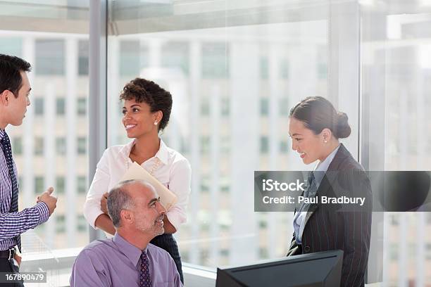 Business People Working Together In Office Stock Photo - Download Image Now - 25-29 Years, 30-34 Years, 30-39 Years