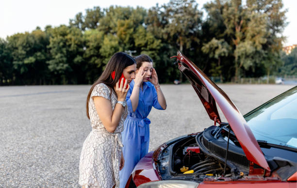 istock Young woman's phone call seeks aid for car trouble 1678932465