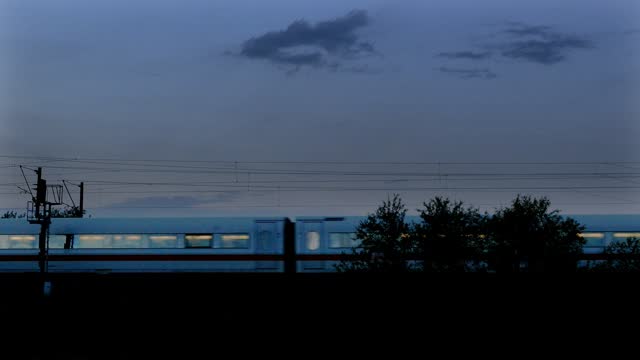 Intercity passenger train in the dusk