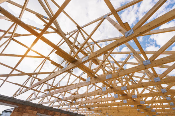 istock New build roof with wooden truss, post and beam framework 1678982607