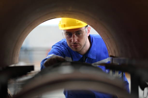 istock worker or engineer working in factory with safety uniform , safety hat and safety glasses , image is safety concept or happy workplace 1679083465