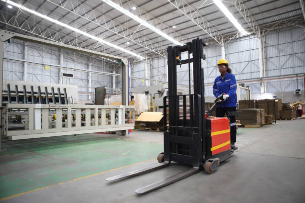 istock worker or engineer working in factory with safety uniform , safety hat and safety glasses , image is safety concept or happy workplace 1679100192