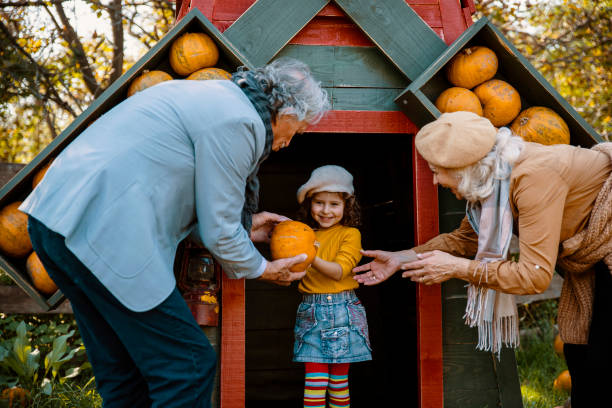 istock Choosing Pumpkin with grandchild 1679100194